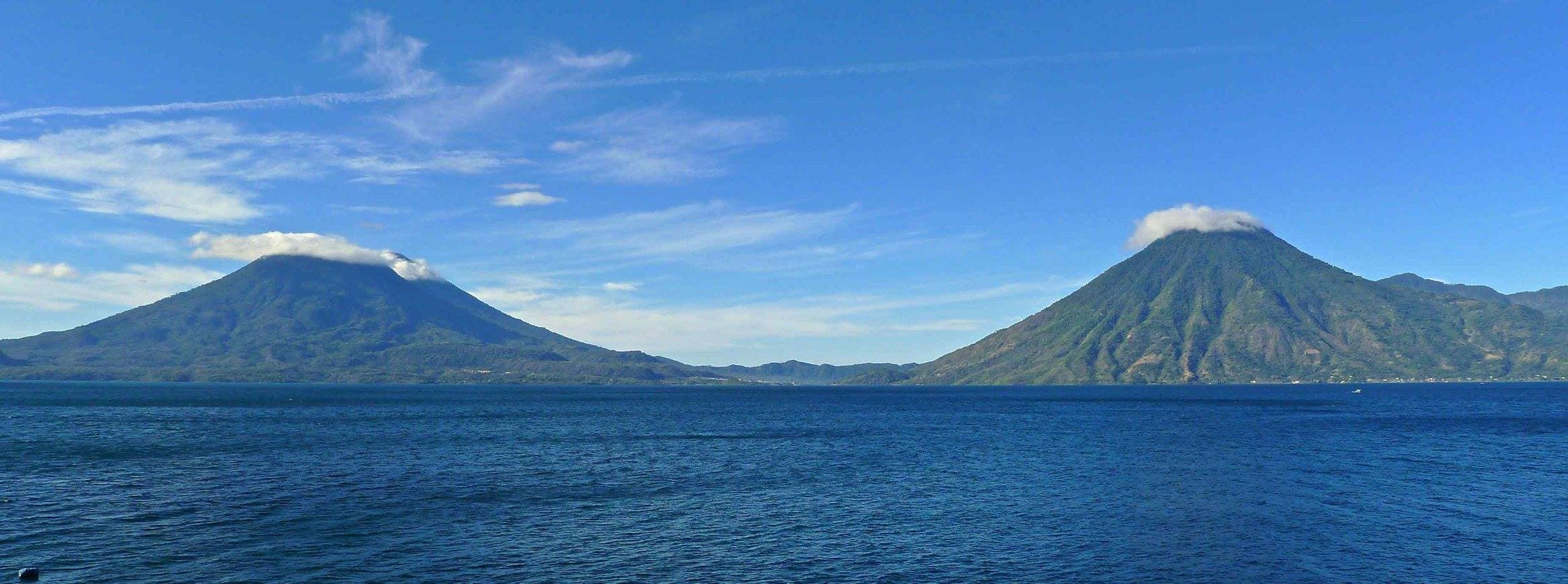 Wide daytime view across Lake Atitlán to the San Pedro and Tolimán volcanoes