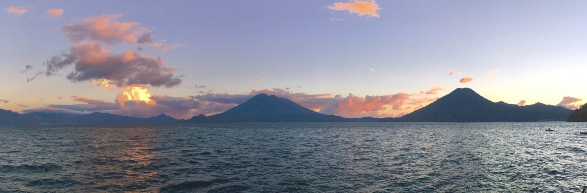 Sunset panorama over Lake Atitlán and its volcanoes