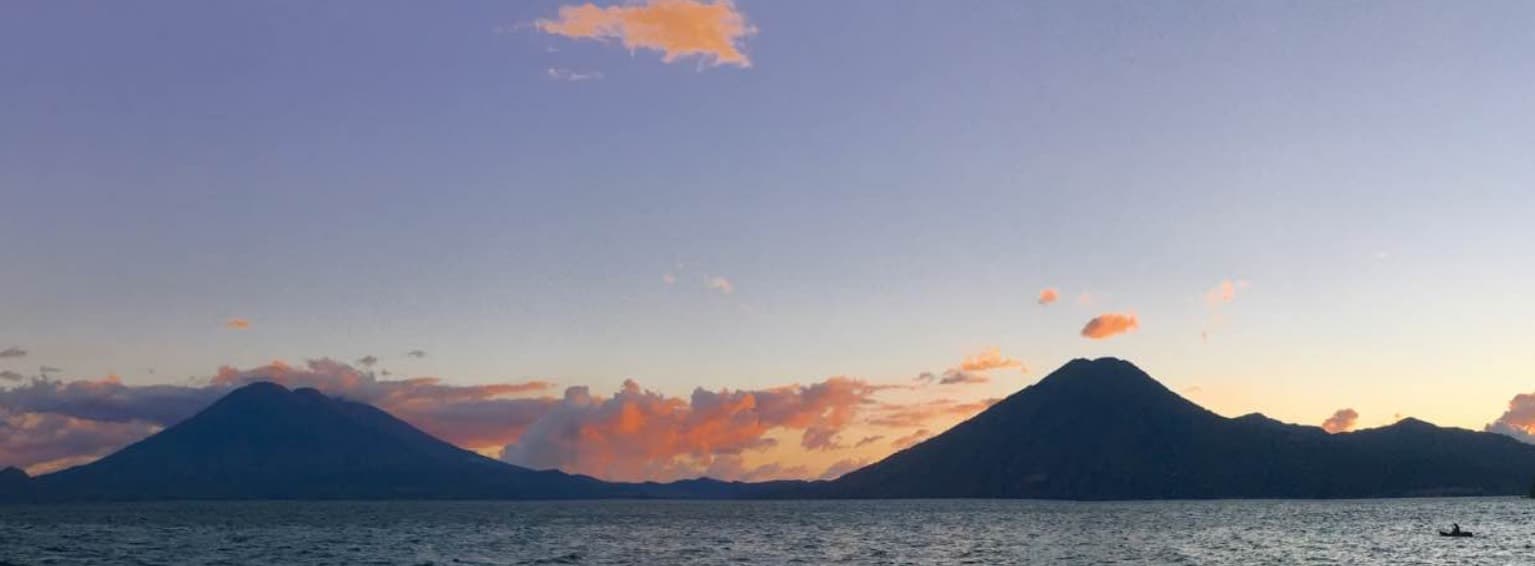 Sunset over Lake Atitlán and its volcanoes